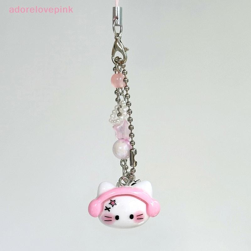 Adorelovepink น่ารัก Hello Kitty ห่วงโซ่โทรศัพท์มือถือสีชมพูหูฟังแมวพวงกุญแจจี้ Anti-Lost Lanyard สายรัดข้อมือโซ่หูฟังกล้อง th