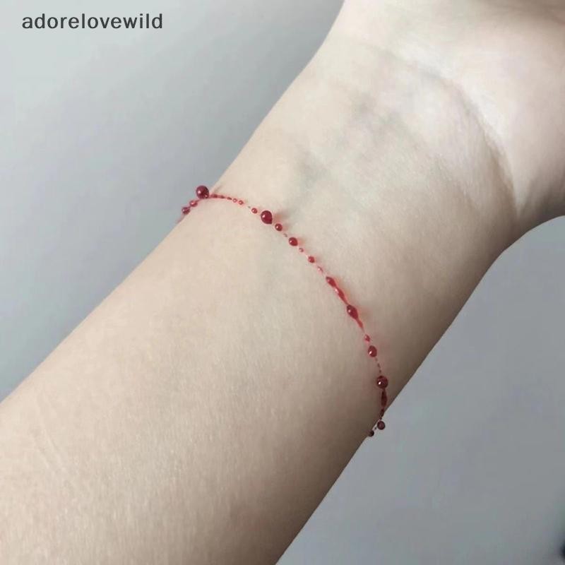 Adorelovewild Creative Red Blood Drop Cross สร้อยข้อมือ 2023 เครื่องประดับฮาโลวีน Punk บุคลิกภาพการออกแบบ Emulational เลือดออกสร้อยคอสร้อยข้อมือ sf