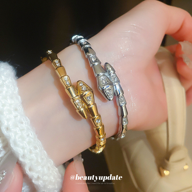 สร้อยข้อมือรูปงูเพทายผู้หญิงสร้อยข้อมือบุคลิกภาพแฟชั่นหรูหราเบาๆเครื่องประดับอารมณ์ระดับไฮเอนด์