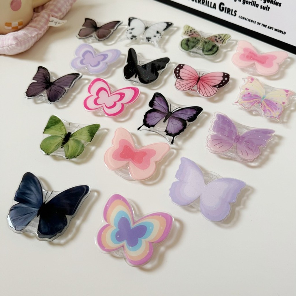 Butterfly กริ๊ปต็อก ที่วางโทรศัพท์มือถือ แบบพับได้ ลายการ์ตูนผีเสื้อ ดอกไม้ สีมาการอง แบบสร้างสรรค์ ที่วางถุงลมนิรภัยแบบ