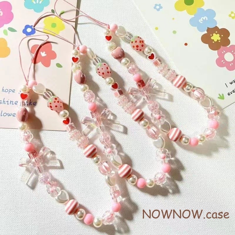 สาวสีชมพูโบว์สร้อยข้อมือคริสตัลมุกเคสโทรศัพท์จี้เหมาะสําหรับเคสโทรศัพท์ทั้งหมด ซีซีดี หูฟังบลูทูธ