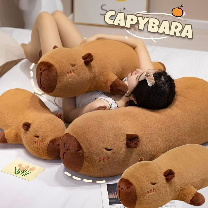 พร้อมส่ง Capybara ตุ๊กตาคาปิบาร่า นุ่มและน่ารัก หมอนอิงหมอนยาว เหมาะกับของขวัญวันเกิด 50/70/90ซม ราคา ถูกที่สุด ดีลบีเคเค รูปภาพหลัก
