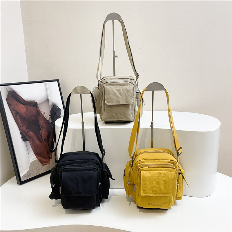 Multi-Pocket กระเป๋ากล้องน้ําหนักเบากันน้ําผ้าไนลอนกระเป๋า Unisex Casual ไหล่ Messen