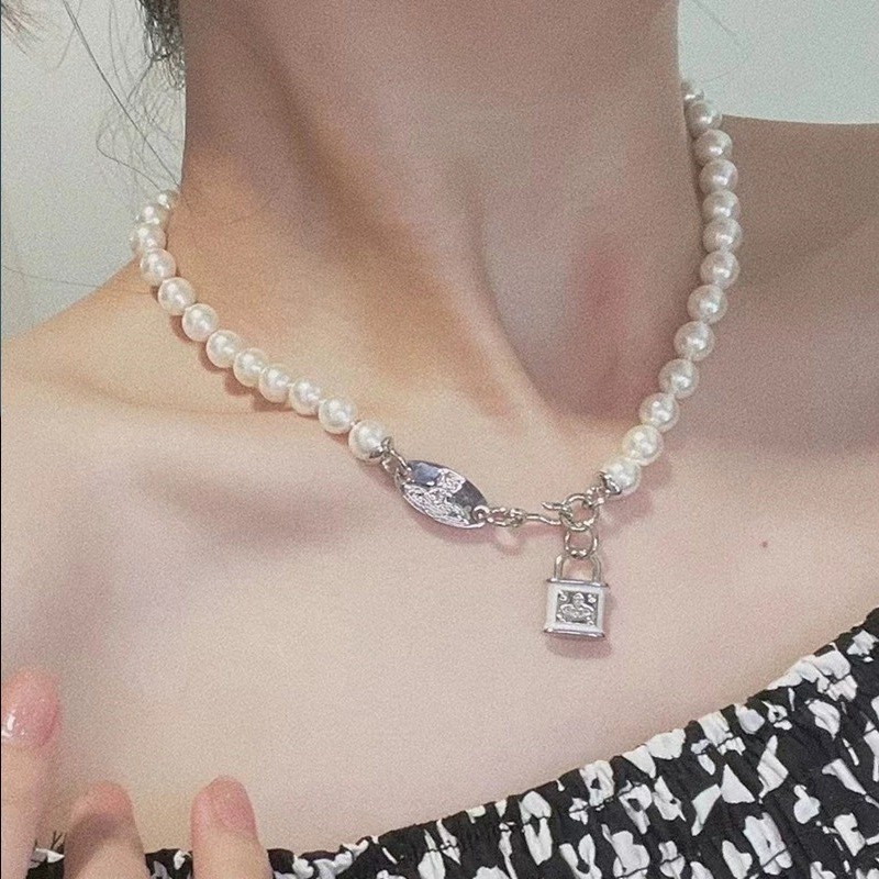 Empress Dowager Cixi สร้อยคอหญิง Retro Choker Splicing Pearl Gold ล็อค Planet ออกแบบ Clavicle Chain Niche สร้อยคอ