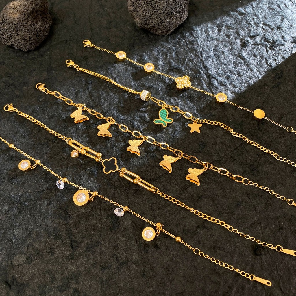 ทั้งชิ้นไทเทเนียมเหล็กชุบ 18K Gold High-End ผีเสื้อ Four-Leaf Clover สร้อยข้อมือขายร้อนขายร้อนสร้อยข้อมือ Best Choice สําหรับสาว