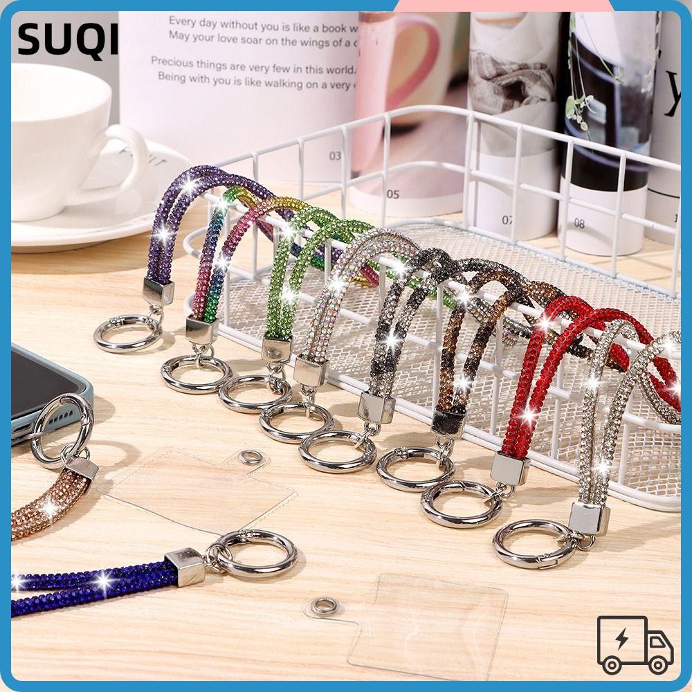 Suqi สายคล้องโทรศัพท์มือถือ ประดับกลิตเตอร์ พลอยเทียม วิบวับ