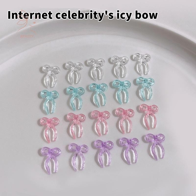 [maybeauty] 50PCS โปร่งใสสีสันริบบิ้นโบว์ตกแต่งเล็บอุปกรณ์เสริม Minimalist Jelly Bowknot เรซิ่นเล็บ Charms DIY หัตถกรรม {TH}