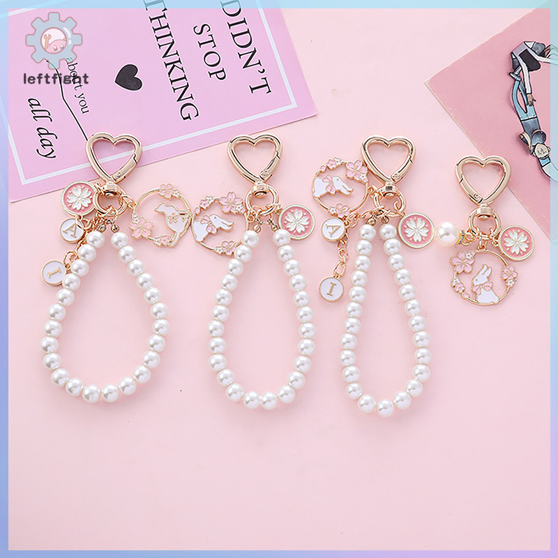 ซ้ายหวานสีชมพู Cherry Blossoms Key Chain กระต่ายโทรศัพท์จี้ Pearl Letter รถ Key แหวนหูฟัง Ch กระเป๋าอุปกรณ์ตกแต่ง GHT