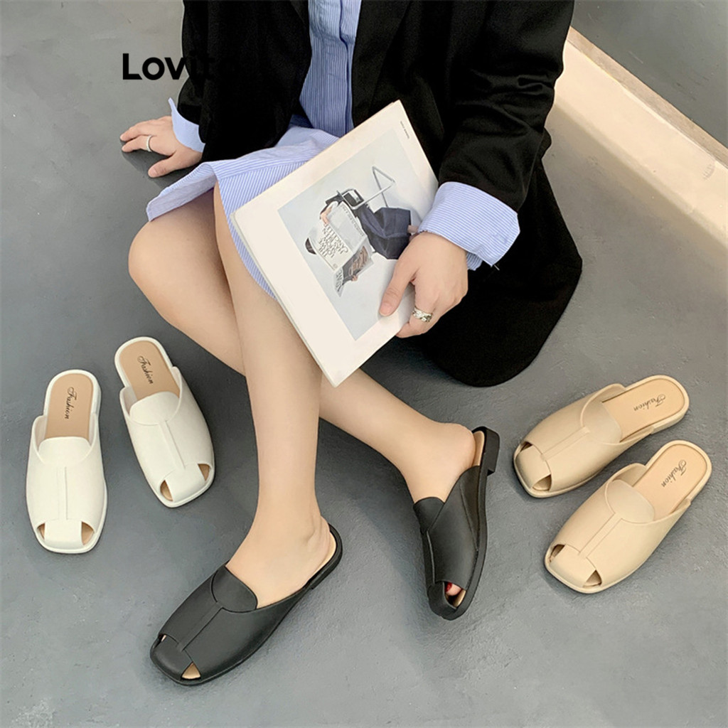 Lovito ชุดลำลองเรียบง่ายสีดำและสีขาวไฮเอนด์ เสื้อกันลมเข้าชุดกับรองเท้าแตะส้นแบนสำหรับผู้หญิง LFA58266