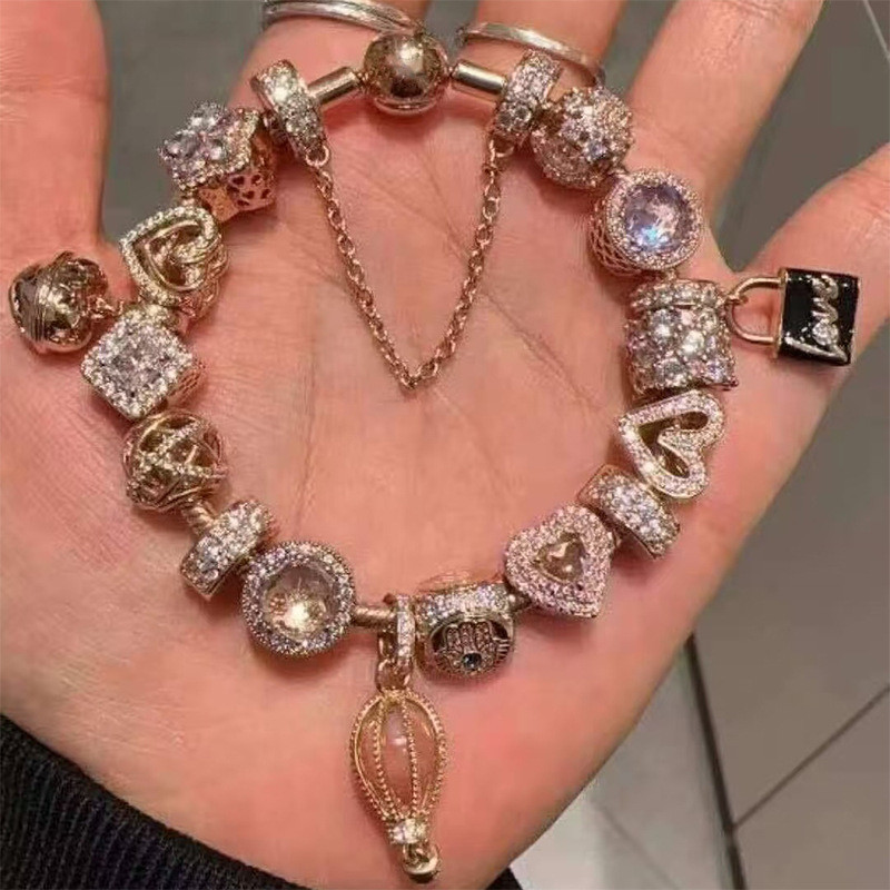 สร้อยข้อมือย้อนยุคหญิงสไตล์อินซอกอารมณ์สร้อยข้อมือลูกปัดแฟนเครื่องประดับมือ