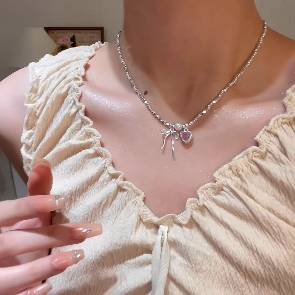 เครื่องประดับโบว์ผู้หญิงเวอร์ชั่นเกาหลี ins อ่อนโยน Girly อารมณ์สร้อยข้อมือสไตล์ใหม่หวานขนาดเล็กสดหัวใจรักหักเงินทุกการแข่งขันสร้อยคออินเทรนด์
