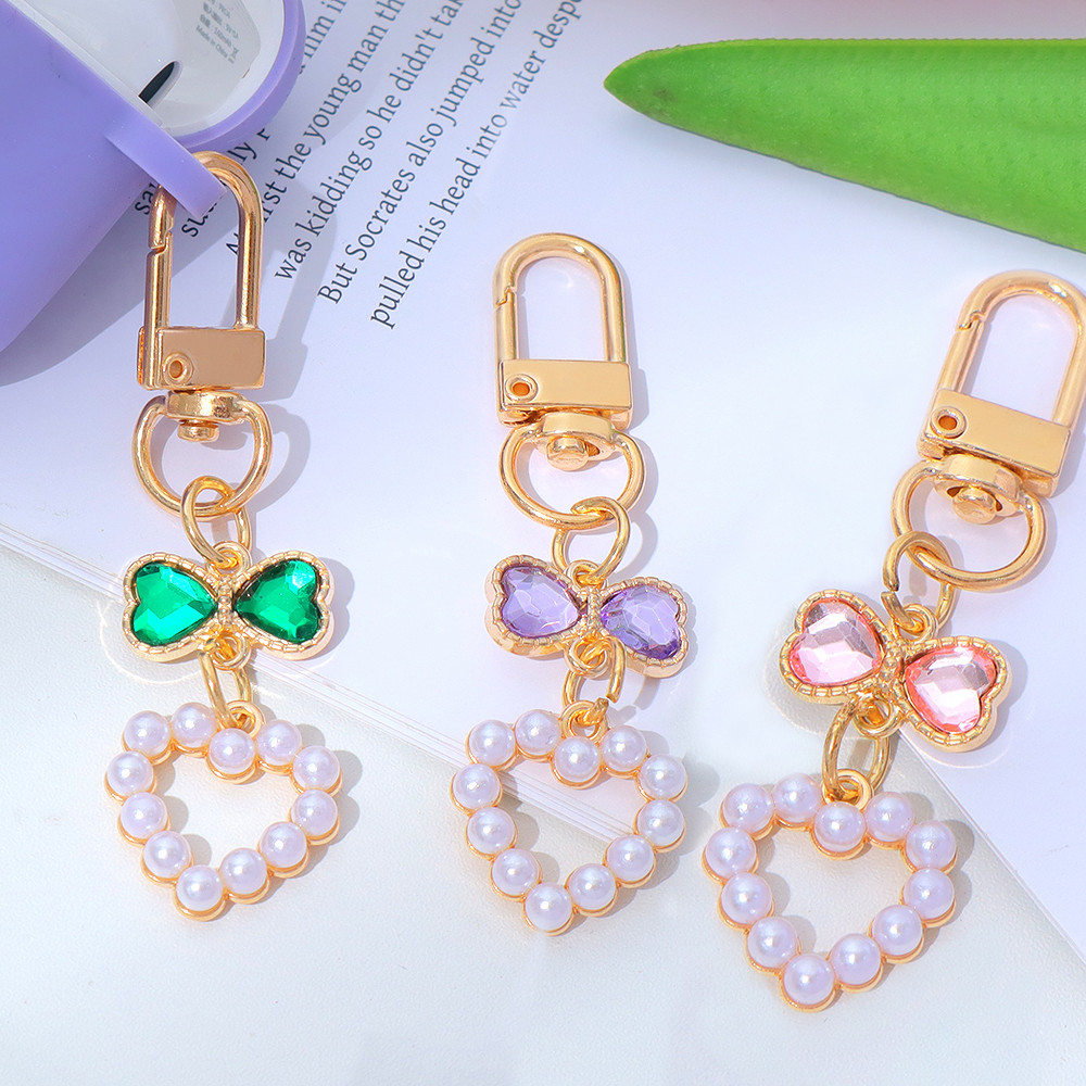 สง่างามมุกหัวใจรักพวงกุญแจแหวนแฟชั่นคริสตัลพวงกุญแจสําหรับหูฟังกรณีกระเป๋าถือเครื่องประดับ