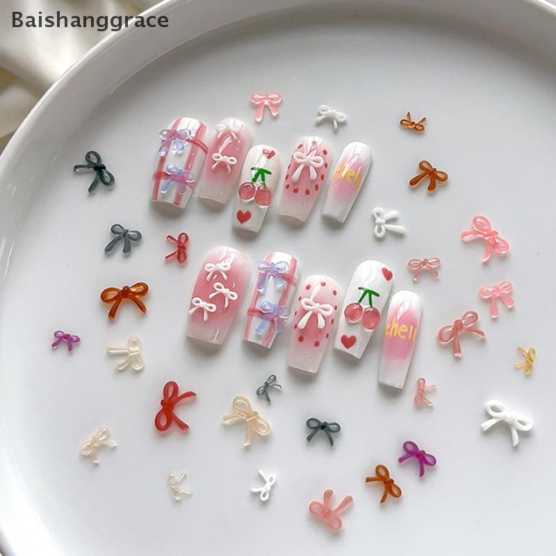 Baishanggrace 50 ชิ้นเรซิ่นโบว์เล็บ Charm จํานวนมากขนาดผสม 3D ริบบิ้น Bowkont Mini Kawaii เล็บเครื่องมือ DIY น่ารักตกแต่งเล็บ HHT