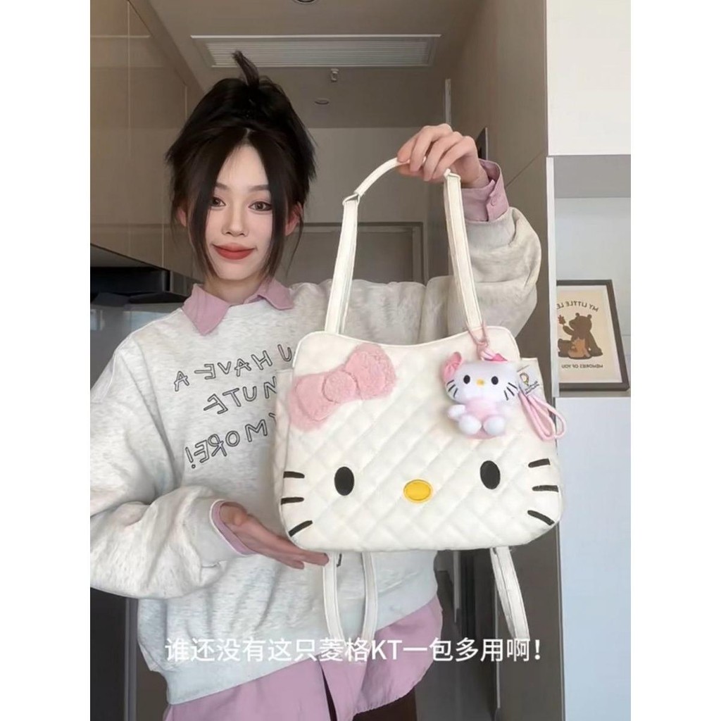 2025 การ์ตูนน่ารัก Hello Kitty ขนาดใหญ่-ความจุกระเป๋าสะพายไหล่หญิงหวานทุกการแข่งขันกระเป๋าเป้สะพายหลัง Mes