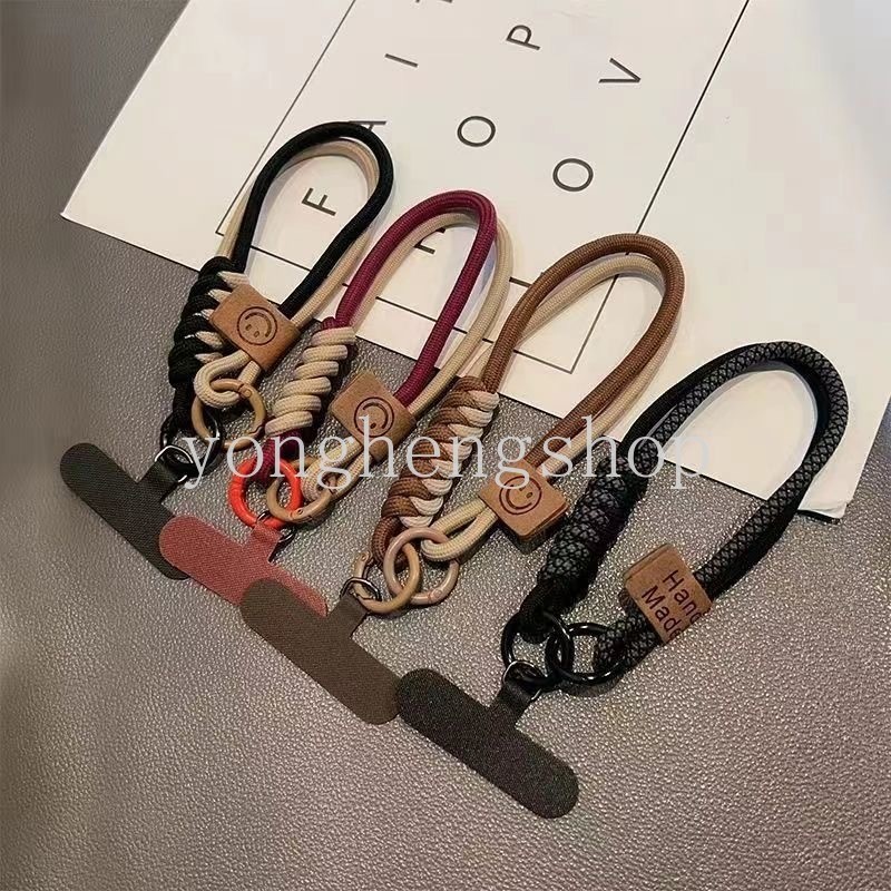 อินเทรนด์ อิน สไตล์สีตัดกันทอเคสโทรศัพท์สากลแขวนเชือกหน้ายิ้มป้องกันการตกอเนกประสงค์โทรศัพท์มือถือเชือกเส้นเล็กสายรัดข้อมือ