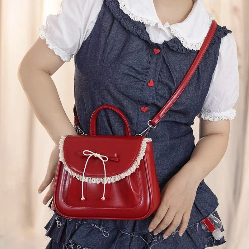 Schwarz ENTEN กระเป๋าเป้สะพายหลังผู้หญิงสีแดงแฟชั่นใหม่กระเป๋าสะพายไหล่อเนกประสงค์