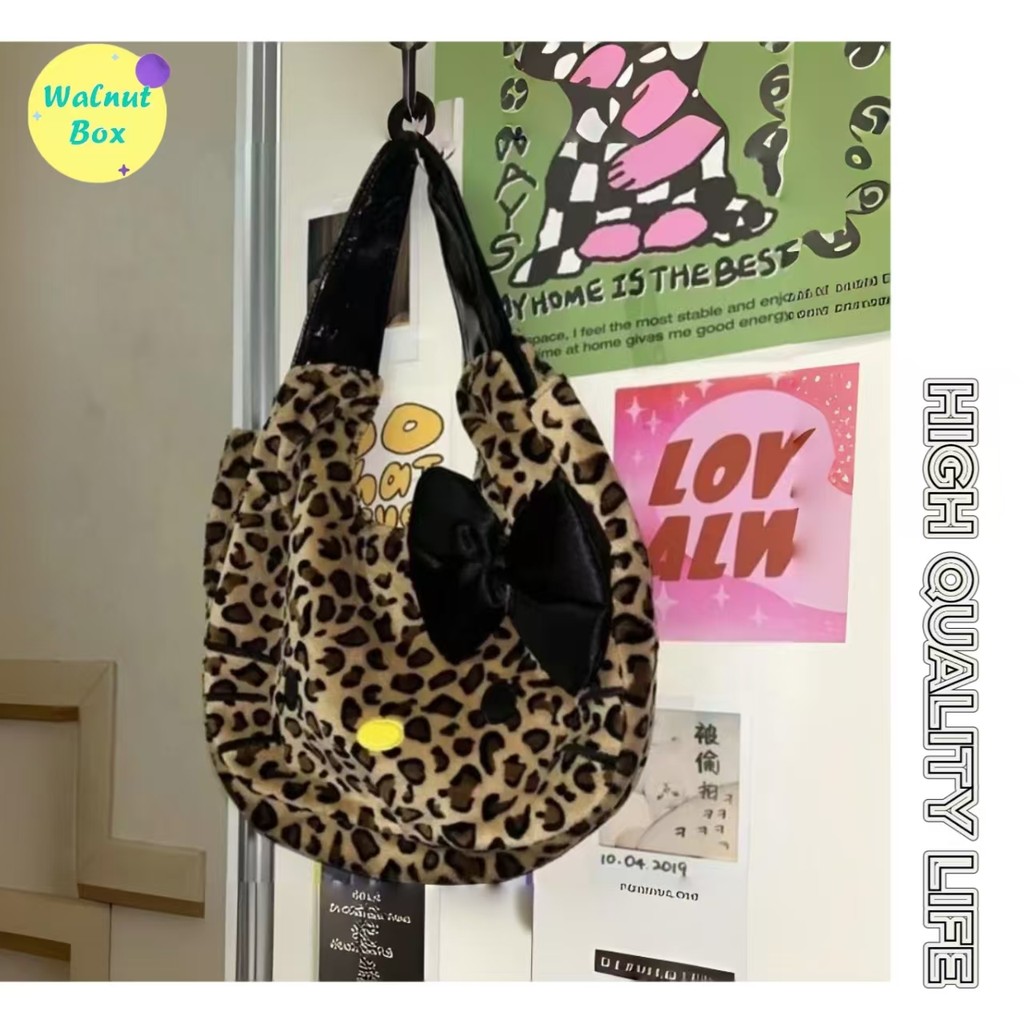 เสือดาวพิมพ์ตุ๊กตาสไตล์ใหม่ Bow Niche กระเป๋าเดินทางสาวน่ารักกระเป๋าถือแฟชั่น