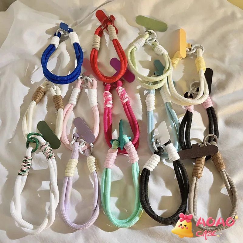 สายคล้องโทรศัพท์แบบทอสีพื้นแฟชั่นน่ารัก พวงกุญแจโทรศัพท์มือถืออเนกประสงค์ สีสันสวยงาม สร้างสรรค์ ที่วางโทรศัพท์มือถือ