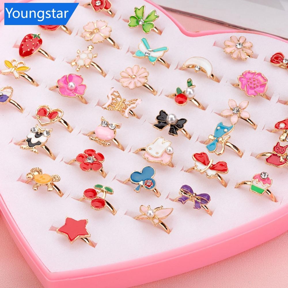 YOUNGSTAR 12/36 ชิ้นเงาปรับเด็กการ์ตูนแหวน Candy ดอกไม้เพชร Bow Shape แหวนชุด Jewellery แหวนของเล่นเด็กผู้หญิง P9R5