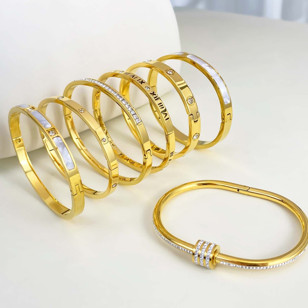 สีขาว Fritillaria/Zircon/Hollow Titanium Steel สร้อยข้อมือผู้หญิงประณีตสไตล์บรรยากาศเครื่องประดับมือสไตล์เกาหลีทุกการแข่งขัน