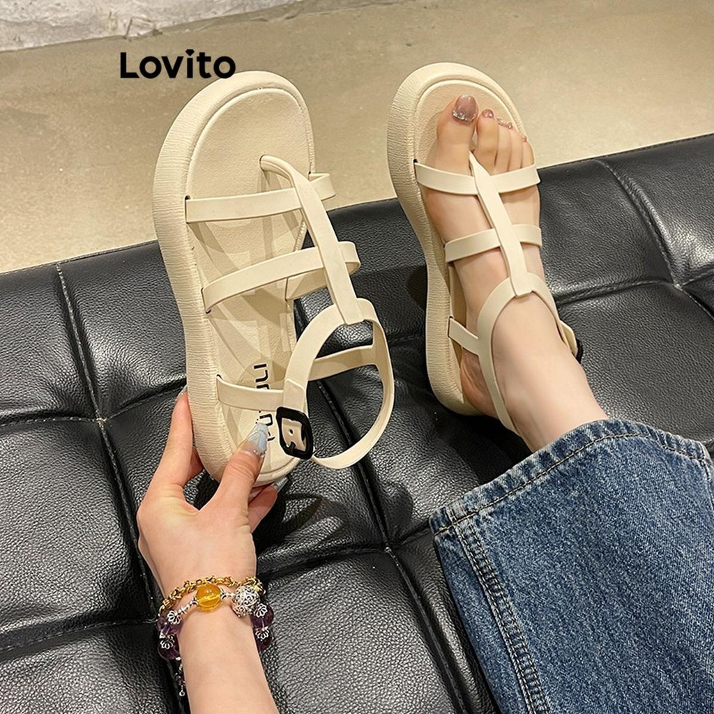 Lovito ลําลองธรรมดาริมทะเลชายหาดรองเท้าแตะโรมันฤดูร้อนจับคู่ทุกวันเวอร์ชั่นเกาหลีรองเท้าแตะส้นแบนสําหรับผู้หญิง LFA68011