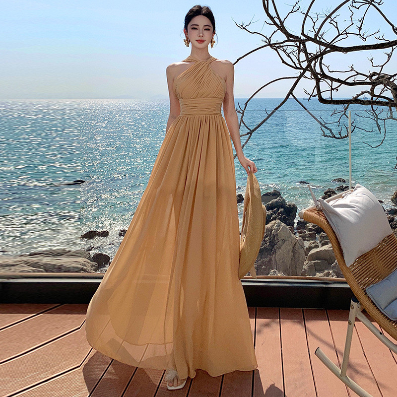 Wyb-ชุดเดรสสไตล์วันหยุดริมทะเลย้อนยุคอารมณ์ห้อยคอเปิดหลังกระโปรงแกว่งใหญ่2025ฤดูร้อนกระโปรงชายหาดนาง