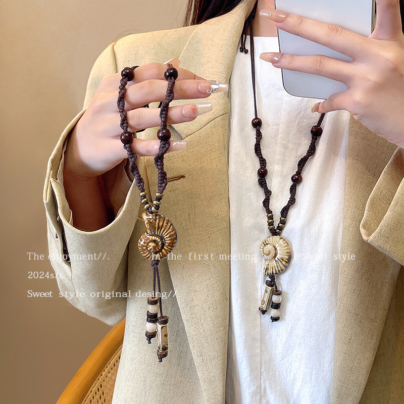 [ในสต็อก] ฤดูใบไม้ร่วงและฤดูหนาวย้อนยุคสังข์สร้อยคอยาวโซ่เสื้อกันหนาว