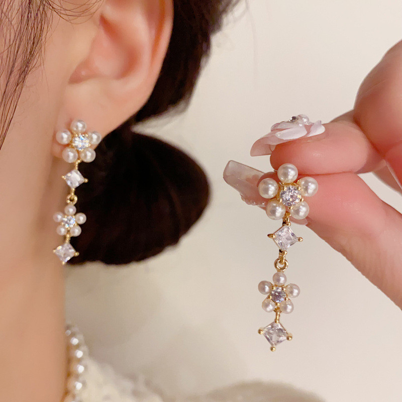ส925 เงินเข็มแฟชั่นหวานอ่อนโยนมุกกลีบพู่ออกแบบต่างหูขายส่ง
