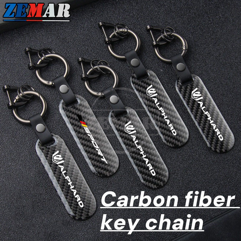 Toyota Alphard พวงกุญแจรถคาร์บอนไฟเบอร์ Hang Tag Key Buckle ที่วางกุญแจรถจักรยานยนต์ High-end แขวนพว