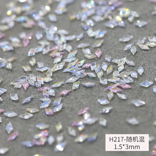 สติกเกอร์เล็บเล็บ Rhinestones เพชรคริสตัลเพทาย 5A สีขาวเงา DIY Rhombus เกล็ดหิมะ 100 ชิ้น KOUDAN