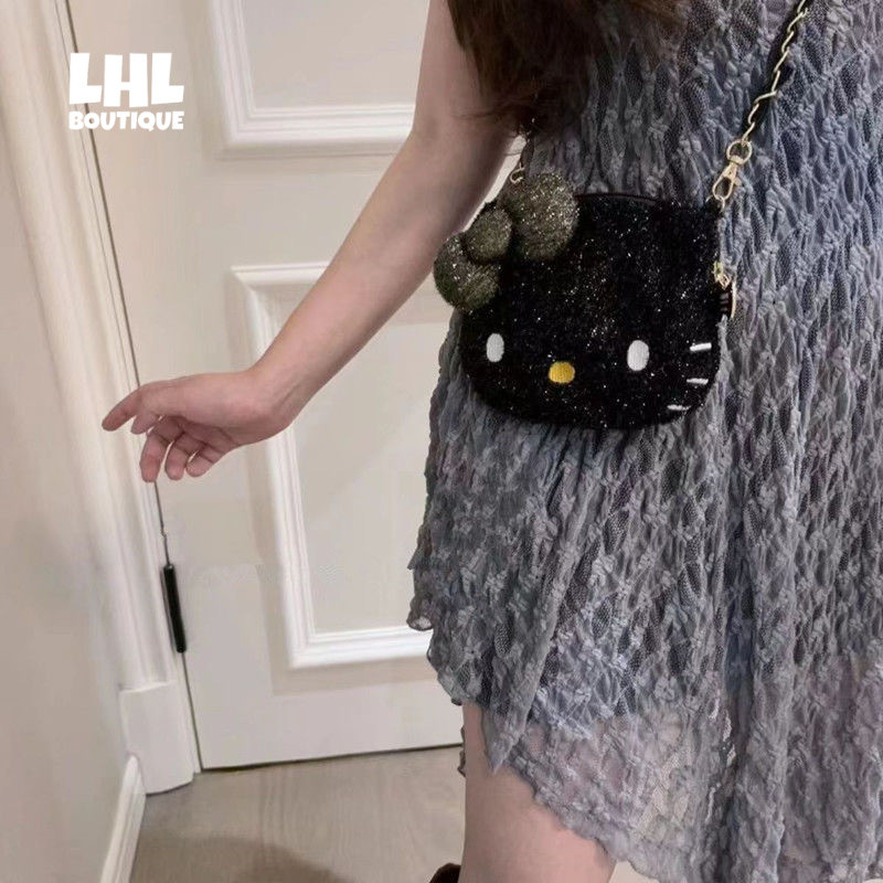 LHL BOUTIQUE น่ารัก Hello Kitty มูลค่าสูงประกายถุงเก็บหัวใจของหญิงสาวอเนกประสงค์ตุ๊กตากระเป๋าสะพายมือถือ