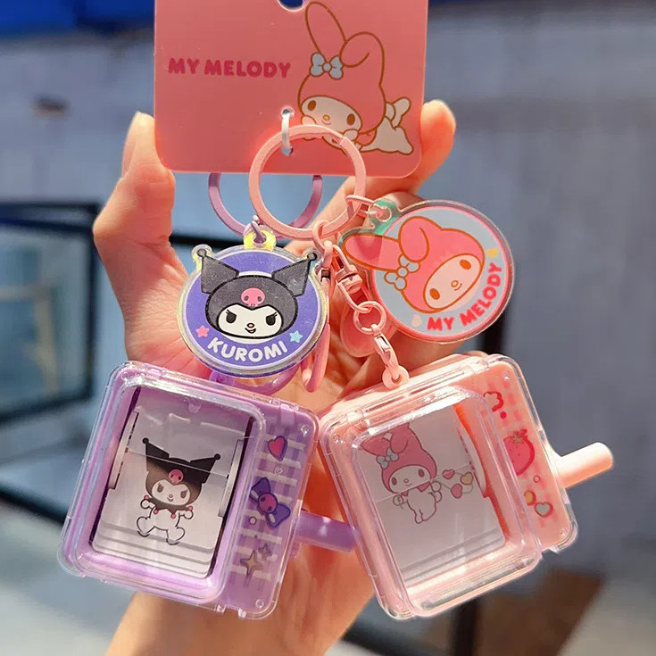 ของแท้ Sanrio Big-Eared Dog Page Flip พวงกุญแจ/การ์ตูนน่ารัก Kuromi เครื่องประดับของขวัญเล็กๆ