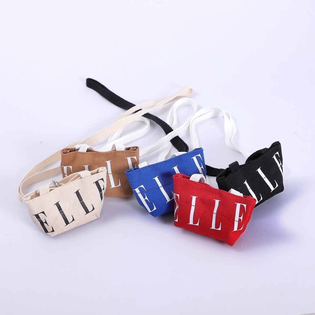 ELLE  PETITE POP  กระเป๋าคล้องคอ ผ้าแคนวาส มีให้เลือก 5 สี รุ่น EWG110425