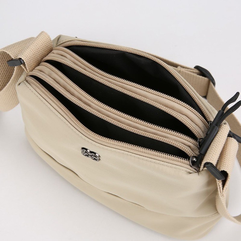 กระเป๋าเป้สะพายหลัง 여성 แบบใหม่ ดีไซน์ไม่ซ้ำใคร ทำจากไนลอน มีความจุมากและน้ำหนักเบา มาพร้อมหลายชั้นสำหรับเก็บของสะดวกสบาย - รูปที่ 2