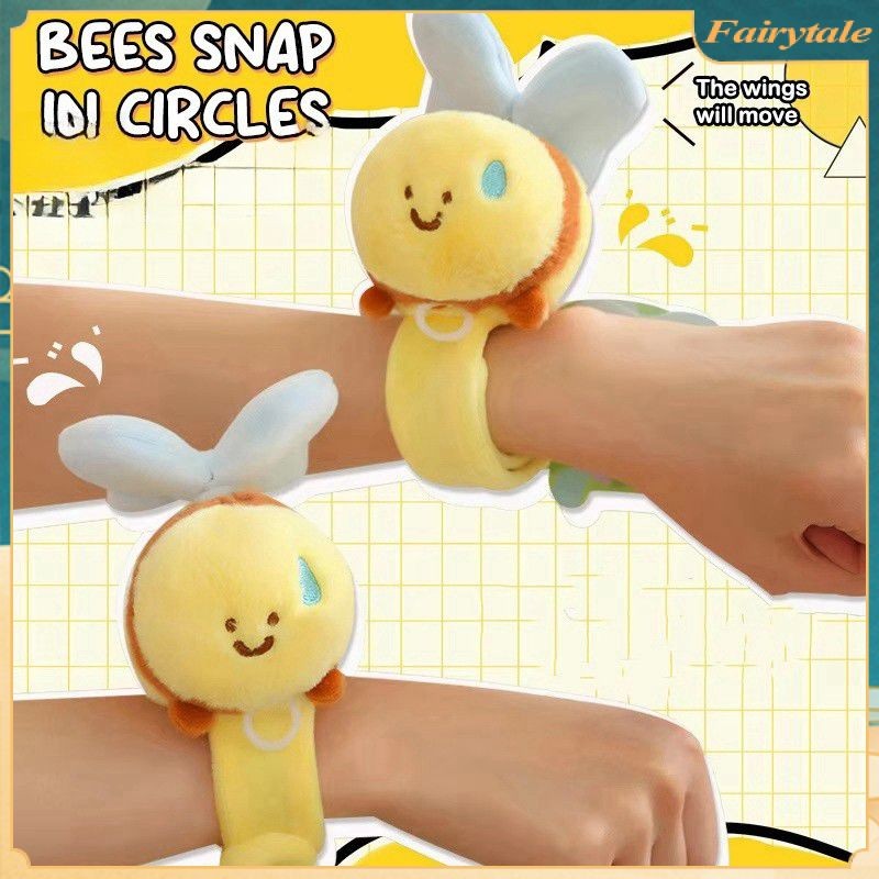 ตุ๊กตาผึ้งปรบมือเป็นวงกลมพร้อมโบว์น่ารัก ของเล่นตบปีก ขนฟู สายรัดข้อมือ แหวน ของเล่นเด็ก ของเล่นตลก
