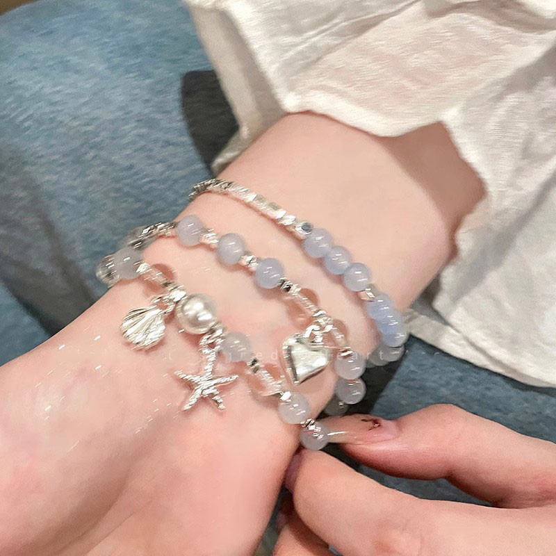 แฟชั่น เกาหลีปลาดาวหัวใจสร้อยข้อมือลูกปัดหญิง อิน น่ารักนักเรียนชายหาดวันหยุดของขวัญ