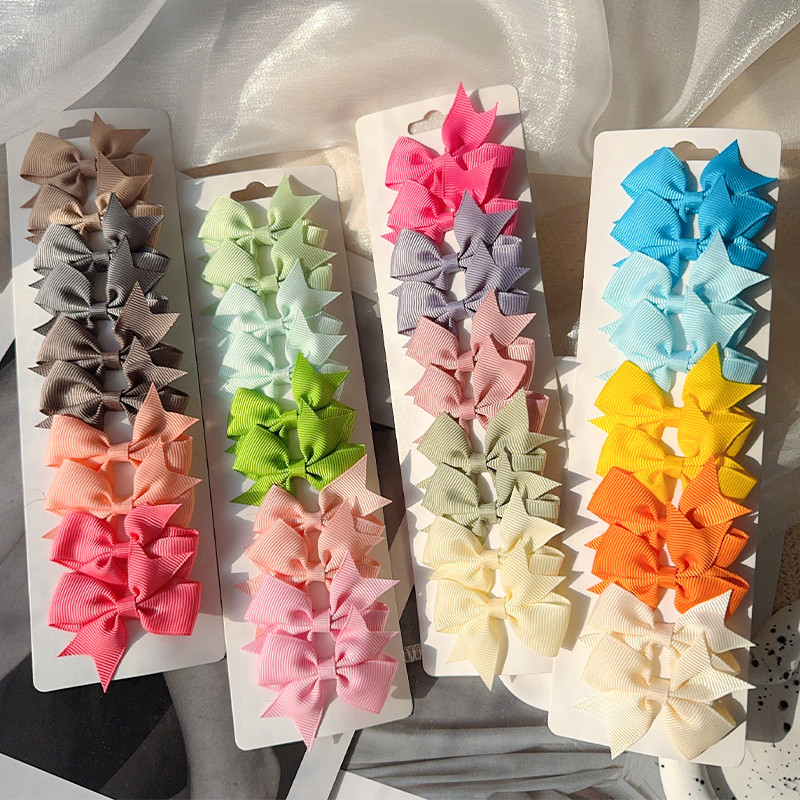 10ชิ้น/เซ็ตเด็กน่ารักแฮนด์เมดริบบิ้นแข็งกุทัณฑ์กิ๊บติดผมเด็กสาวอุปกรณ์ผมขายส่ง