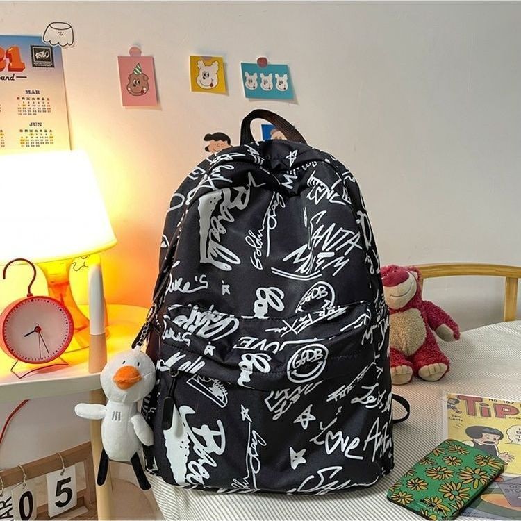 Zwt กระเป๋านักเรียนเวอร์ชั่นเกาหลี Harajuku Graffiti High School Student Mori สไตล์กระเป๋าเป้สะพายหลัง All-Match กระเป๋าเป้สะพายหลัง