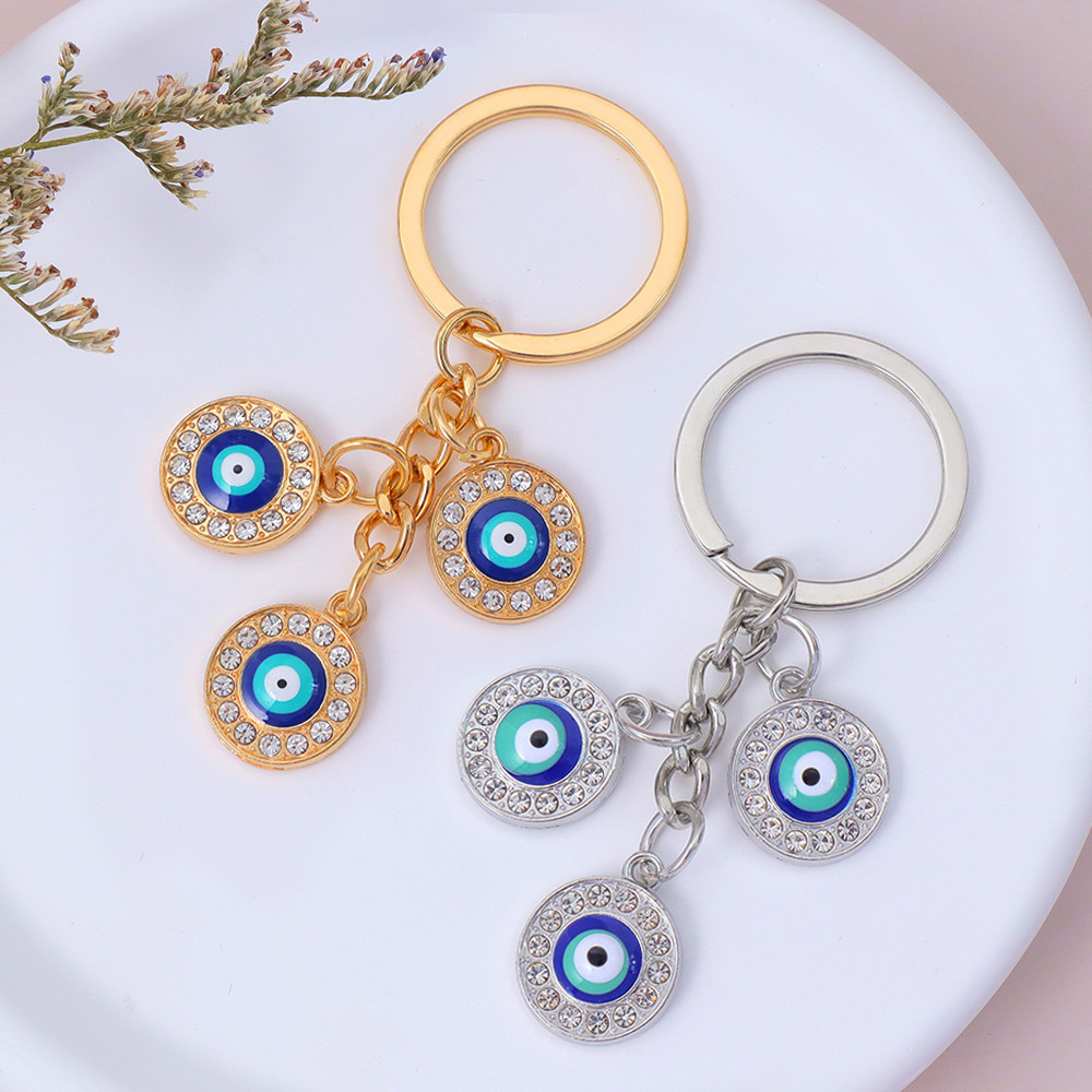 Blue Evil Eyes พวงกุญแจ Rhinestone Eye-shaped พวงกุญแจกระเป๋าเป้สะพายหลังจี้เครื่องประดับ Fridends ของขวัญ