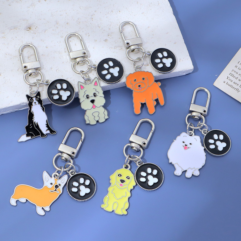 สร้างสรรค์สุนัขพวงกุญแจโลหะแฟชั่นตีนลูกสุนัขพวงกุญแจรถที่เก็บกุญแจอุปกรณ์เสริมของที่ระลึกของขวัญ