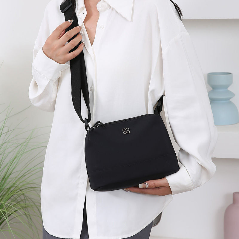 กระเป๋าเป้สะพายหลัง 여성 แบบใหม่ ดีไซน์ไม่ซ้ำใคร ทำจากไนลอน มีความจุมากและน้ำหนักเบา มาพร้อมหลายชั้นสำหรับเก็บของสะดวกสบาย - รูปที่ 3