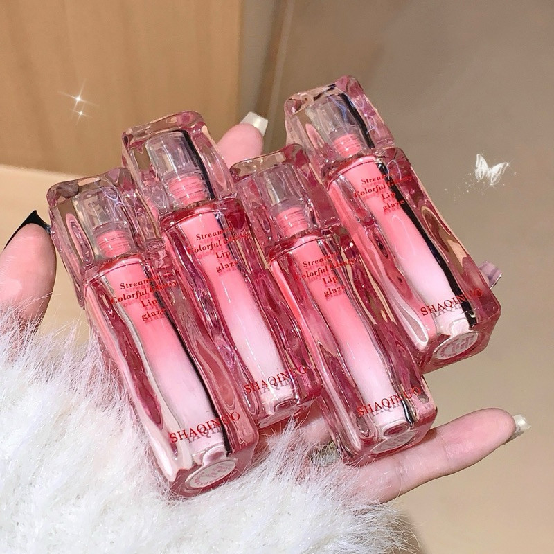 L-39🌟SHAQINUO Flowing Shine Lip Glaze ลิปกลอสเนื้อใสฉ่ำวาว มอบริมฝีปากอิ่มน้ำ ดูสุขภาพดี สีสวยติดทน