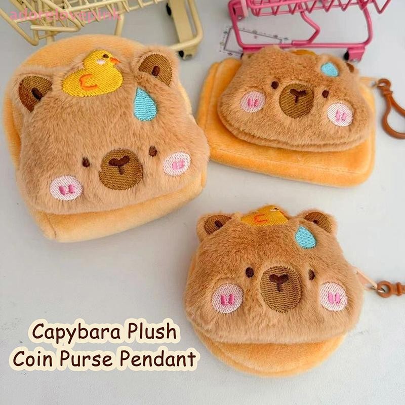 Adorelovepink Capibara Plush กระเป๋าใส่เหรียญจี้การ์ตูน Capybara หูฟังกระเป๋าเก็บพวงกุญแจแบบพกพากรณีกระเป๋าริมฝีปาก th