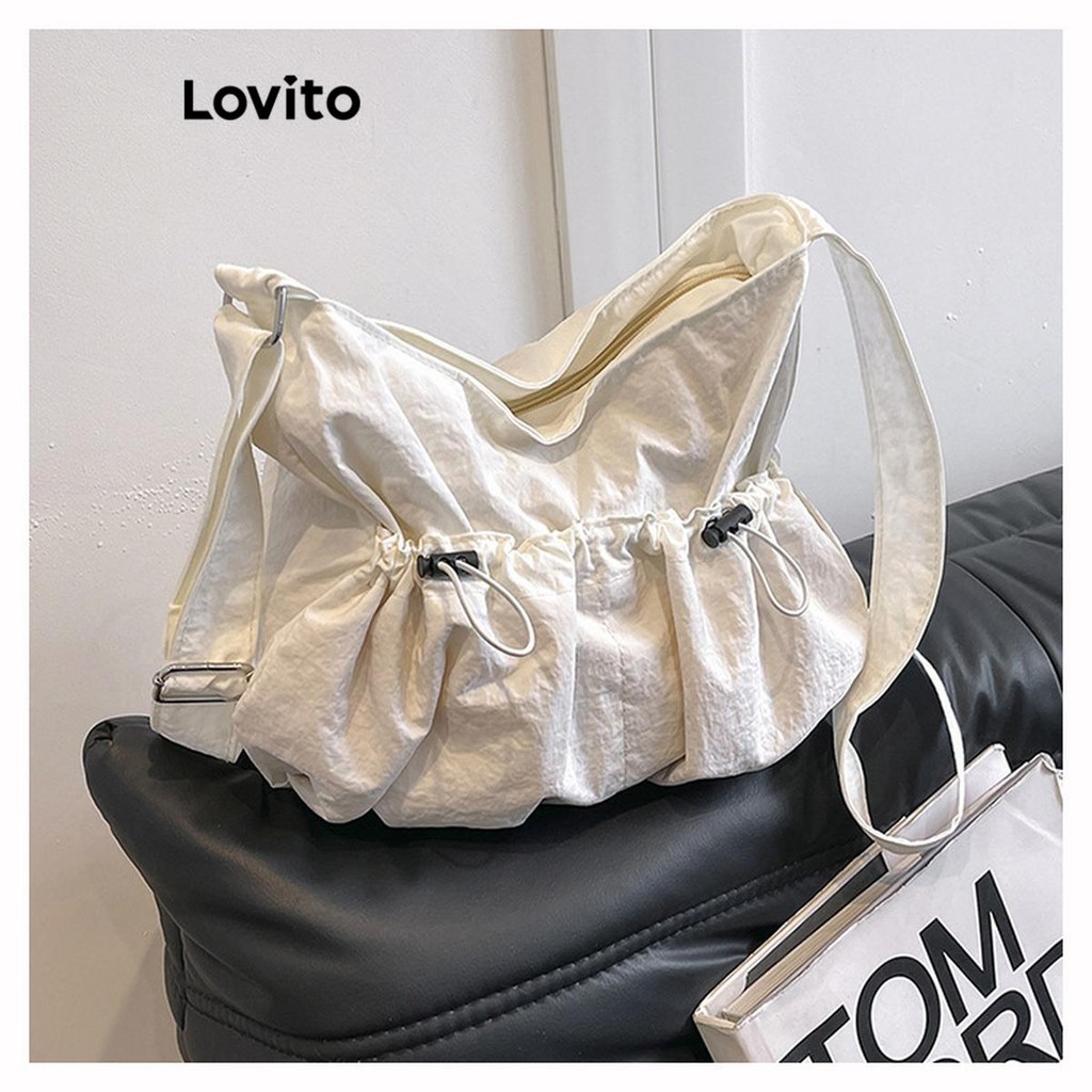 Lovito กระเป๋าสะพายไหล่แบบมีเชือกรูดสำหรับใส่ของสำหรับนักเรียน ดีไซน์สีมาการอง ความจุสูง สำหรับผู้หญิง LFA55082