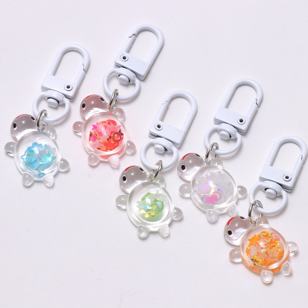 1 ชิ้นที่มีสีสันพวงกุญแจเต่าเรืองแสงสําหรับอุปกรณ์เสริมตกแต่งแยกแหวน Keyfob Charm สําหรับของขวัญเด็ก