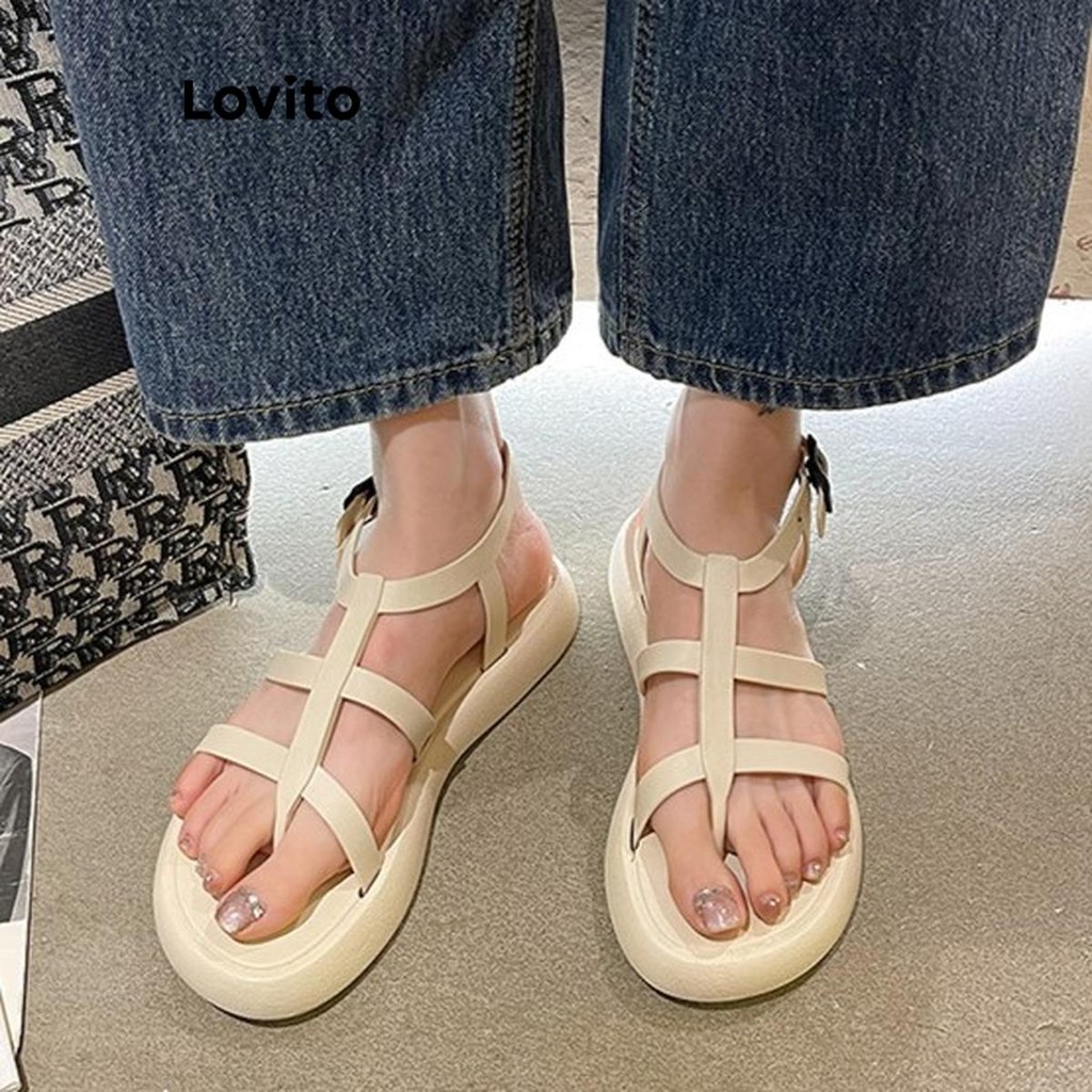 Lovito ลําลองธรรมดาริมทะเลชายหาดรองเท้าแตะโรมันฤดูร้อนจับคู่ทุกวันเวอร์ชั่นเกาหลีรองเท้าแตะส้นแบนสําหรับผู้หญิง LFA68011