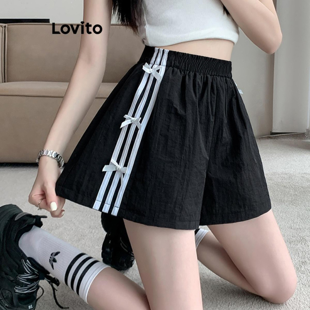 Lovito กางเกงขาสั้นลําลองขาสั้นโบว์ลายทางสําหรับผู้หญิง LNA66327