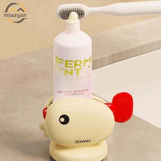 😍COD😍เครื่องบีบยาสีฟันแบบหมุนด้วยมือรูปปลาทองน่ารัก-ถ้วยดูดแบบพกพาคงที่ที่ใส่ยาสีฟันกันลื่น