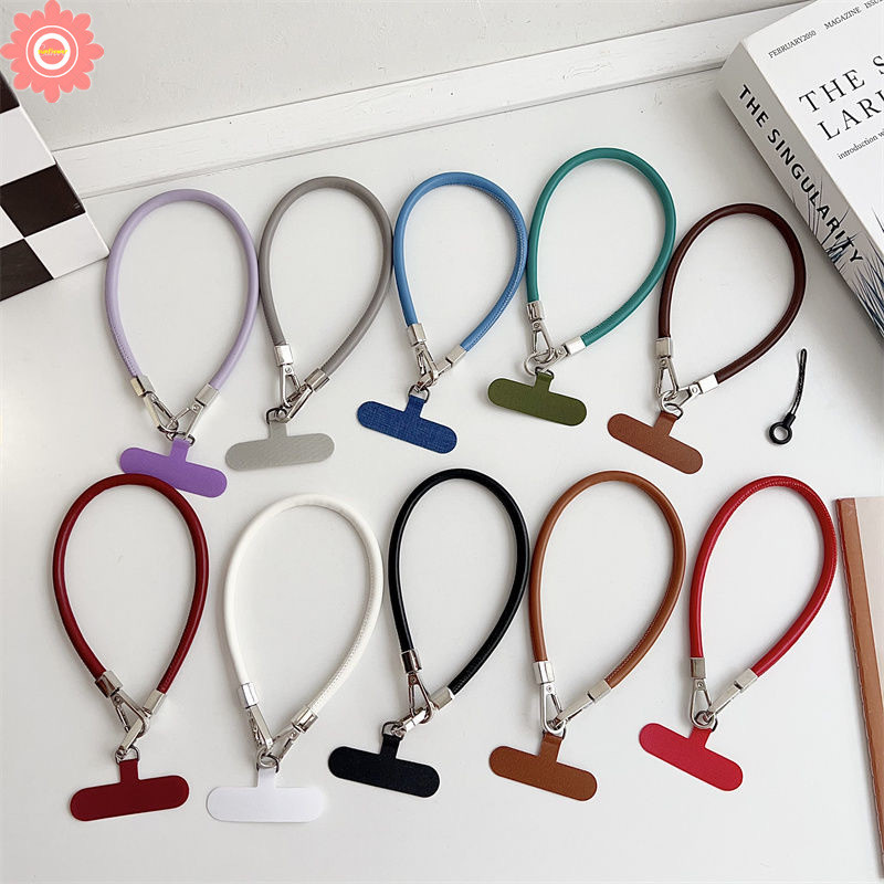 อิน แฟชั่นเรียบง่ายสีทึบข้อมือสั้นสายคล้องโทรศัพท์หนังอินเทรนด์หรูหราสร้างสรรค์ขั้นสูงแฟชั่นไวน์แดงหนังสายคล้องโทรศัพท์เชือกเส้นเล็ก