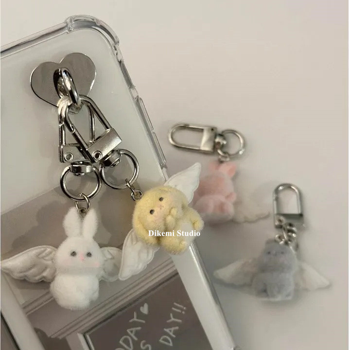 สไตล์เกาหลี อิน น่ารักแองเจิลวิงกระต่ายรถพวงกุญแจกระเป๋าหูฟังจี้อุปกรณ์เสริมกระเป๋าจี้